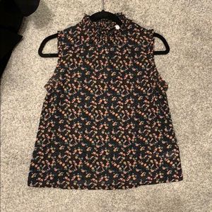 Floral mock neck sleeveless blouse